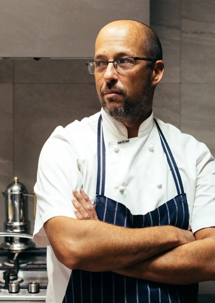 David Lee in his chef's jacket and apron