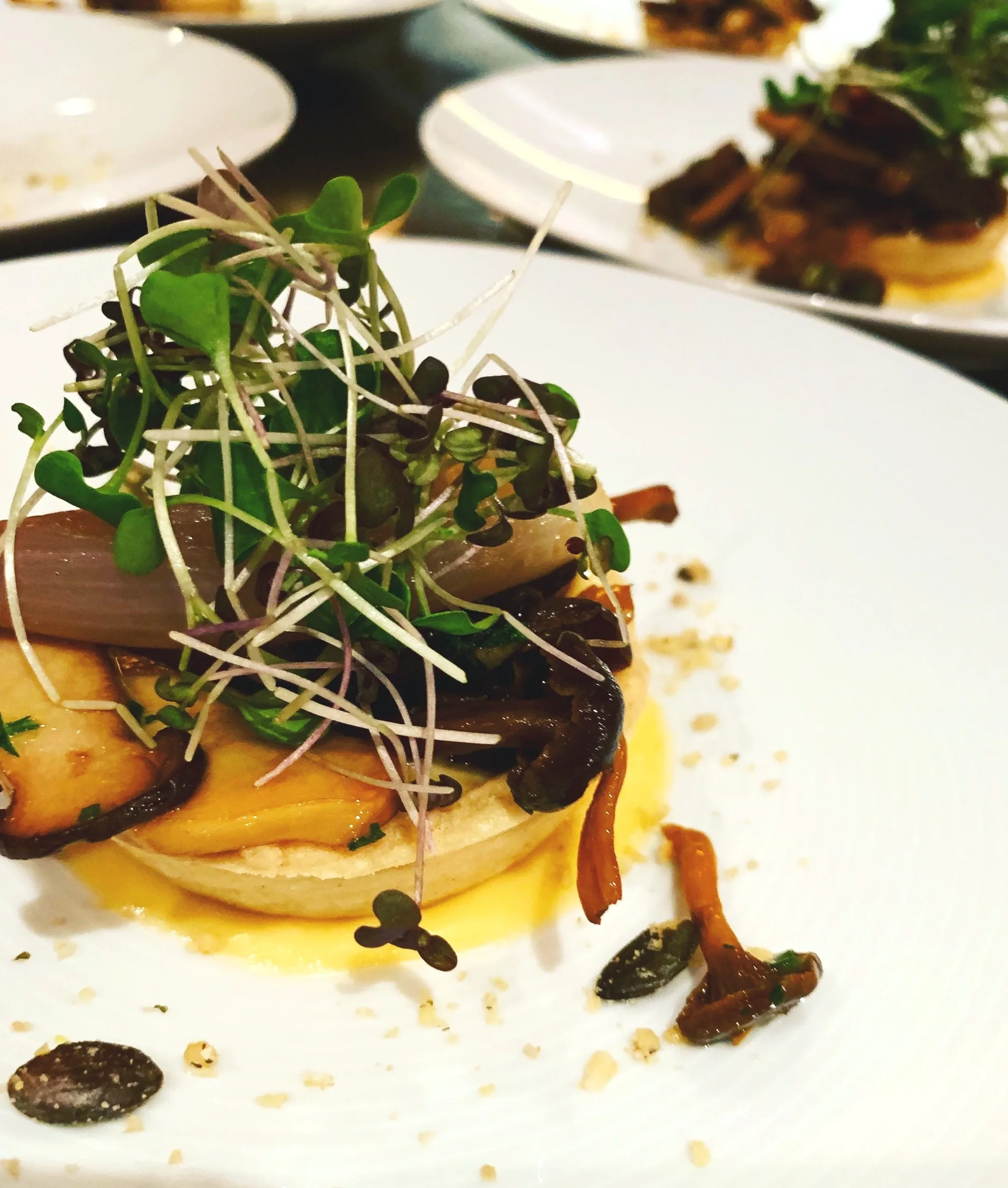 London Autumn 2019 : Chanterelle tart with roasted shallot, baby herbs and parmesan fondue