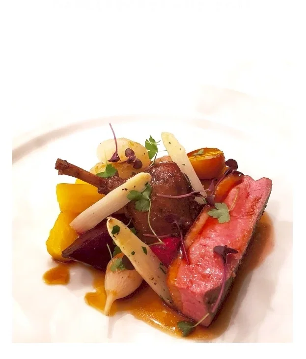 Duck breast with roasted baby vegetables and jus