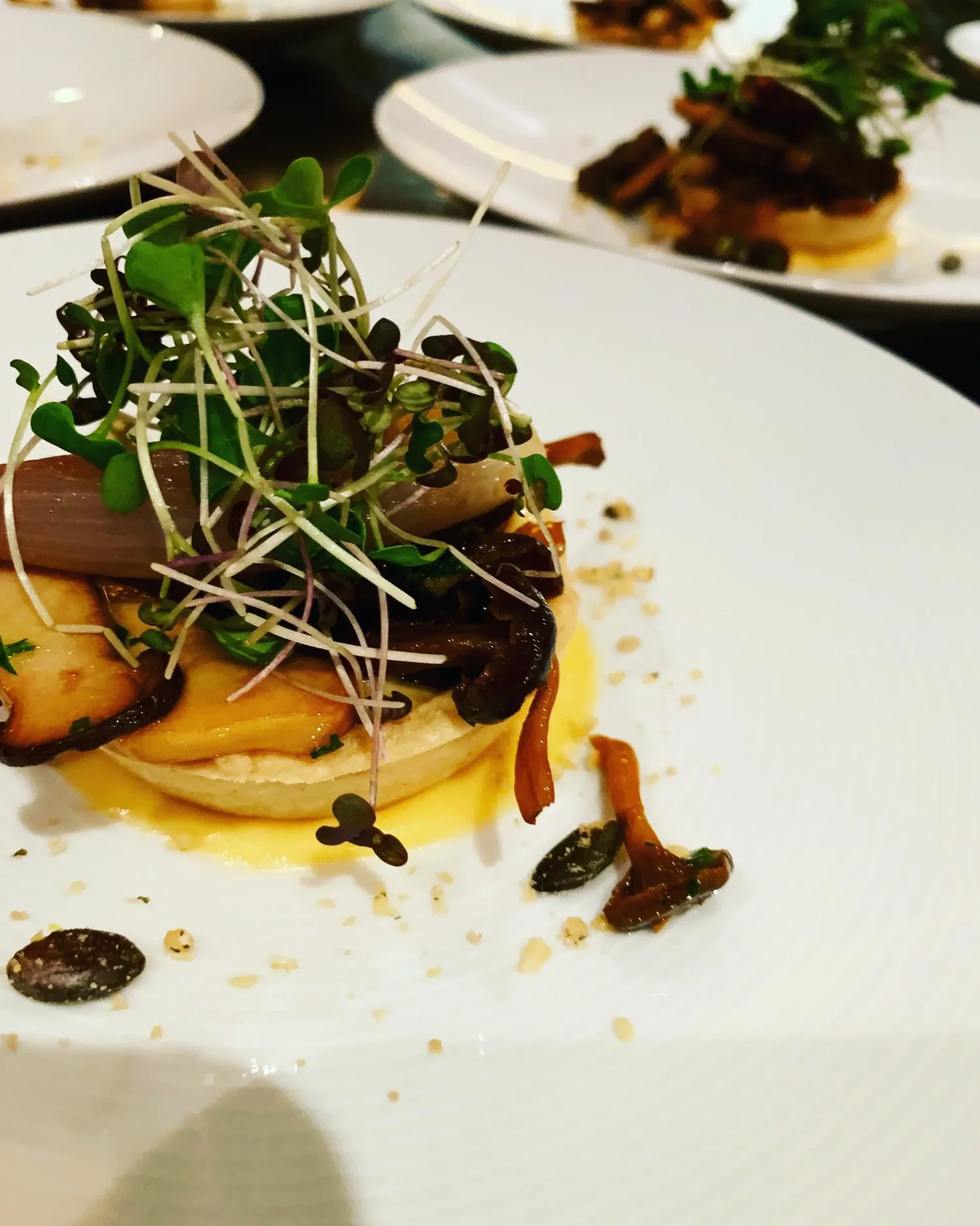 London Autumn 2019 : Chanterelle tart with roasted shallot, baby herbs and parmesan fondue