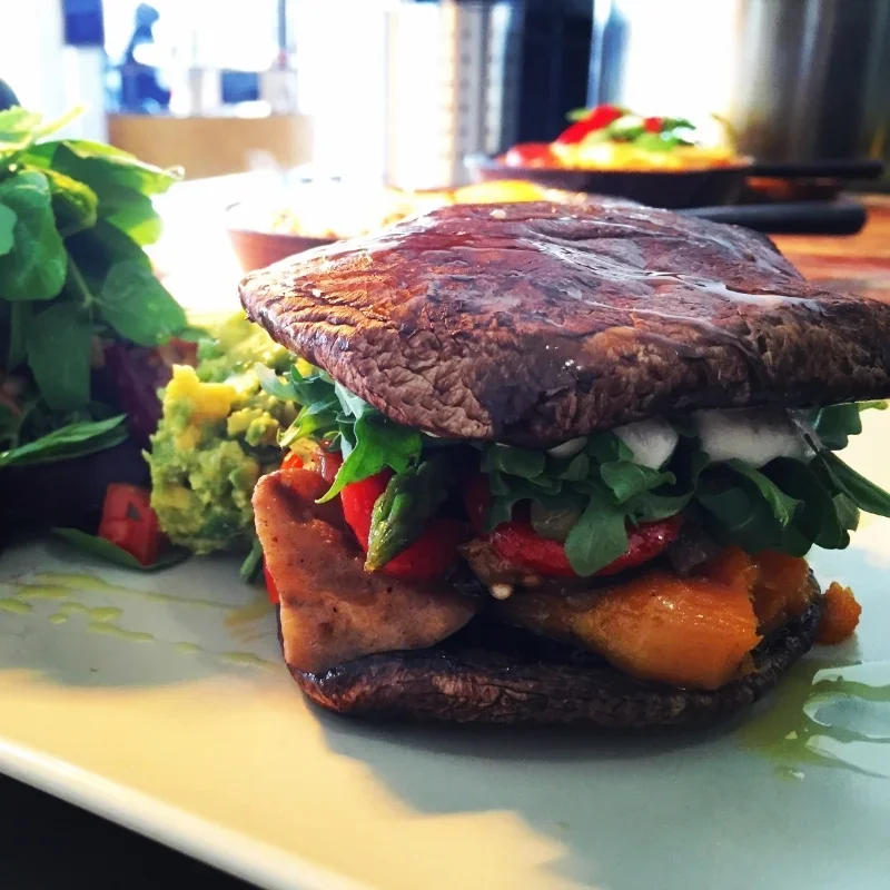 Vegan Burger with roasted vegetables and almond mayonnaise.