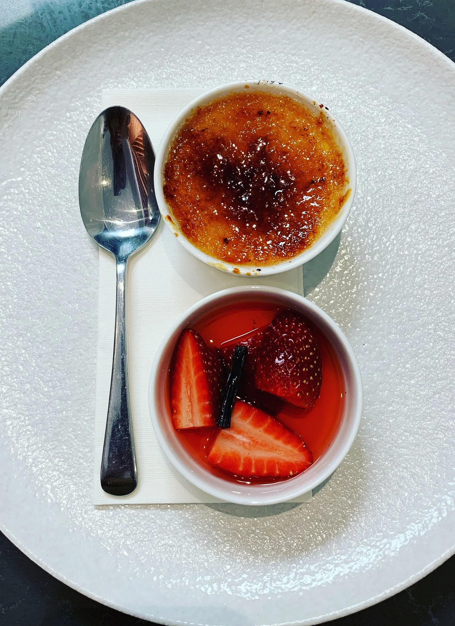 Crème Brulee with vanilla poached strawberries